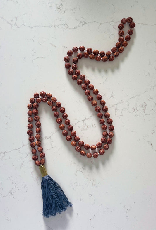 Carved Brown Wooden Mala Necklace with Gray Tassel