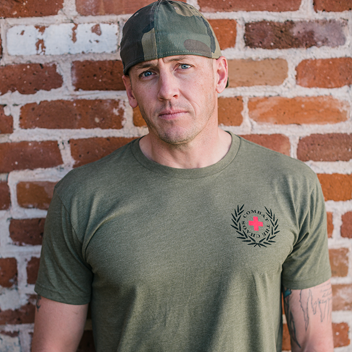 Man wearing a green CTC t-shirt