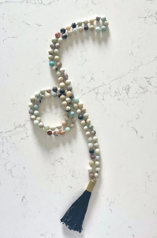 Light Colored Matte Mala Necklace with Black Tassel