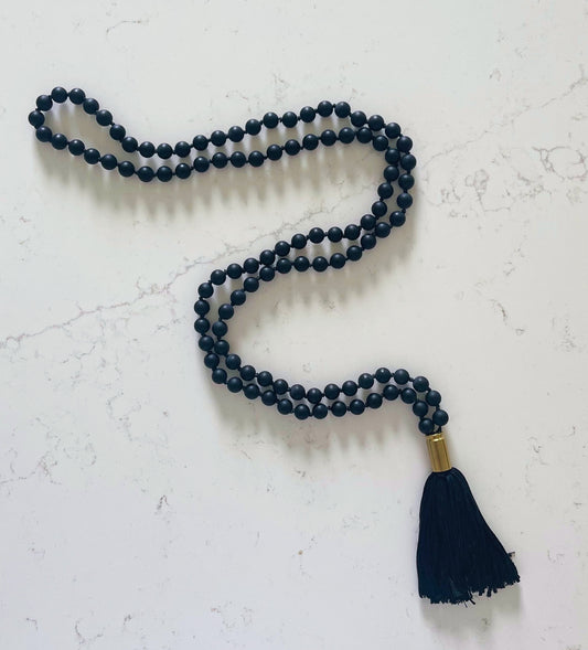 Black mala necklace with a black tassel
